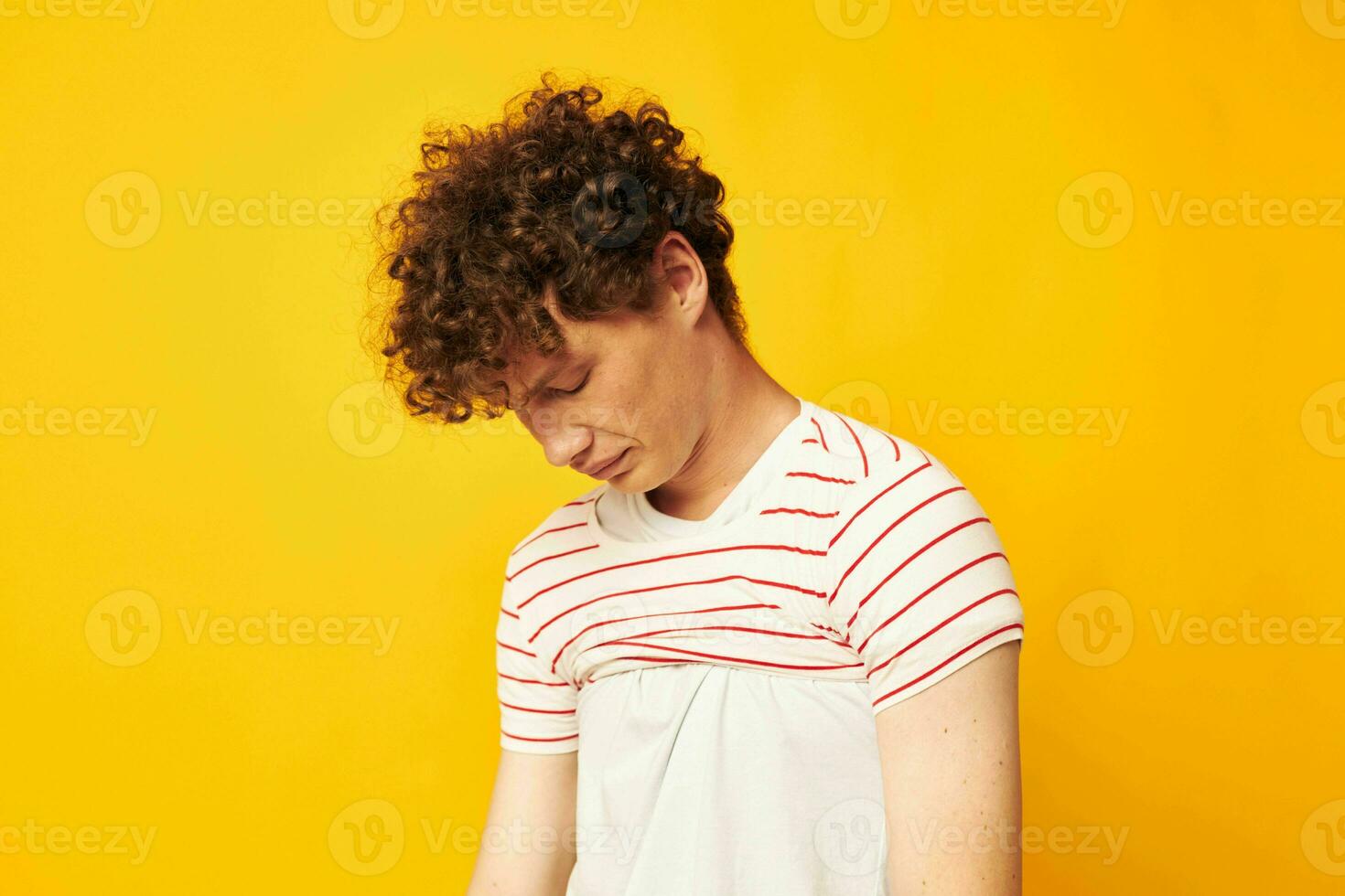 cute red-haired guy striped t shirt posing summer clothing isolated background unaltered photo