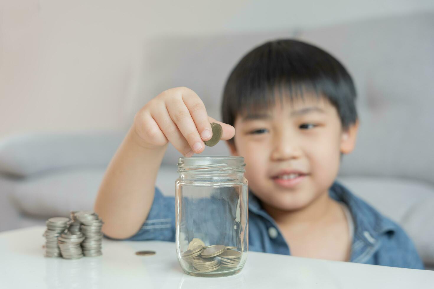 Save money. children putting coin for saving. wealth, Finance, insurance, investment, education, future, plan life, learn, banking, family, health, health and accident insurance. photo