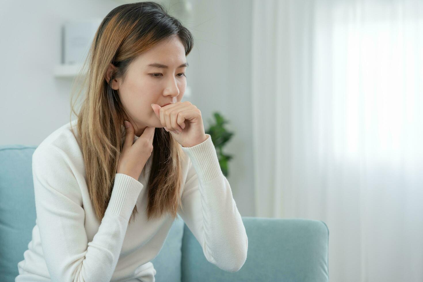 sick woman with a headache sitting under blanket, female sneezing and runny nose with seasonal influenza, allergic, high fever and influenza, resting, virus, coronavirus, feel illness, respiratory photo