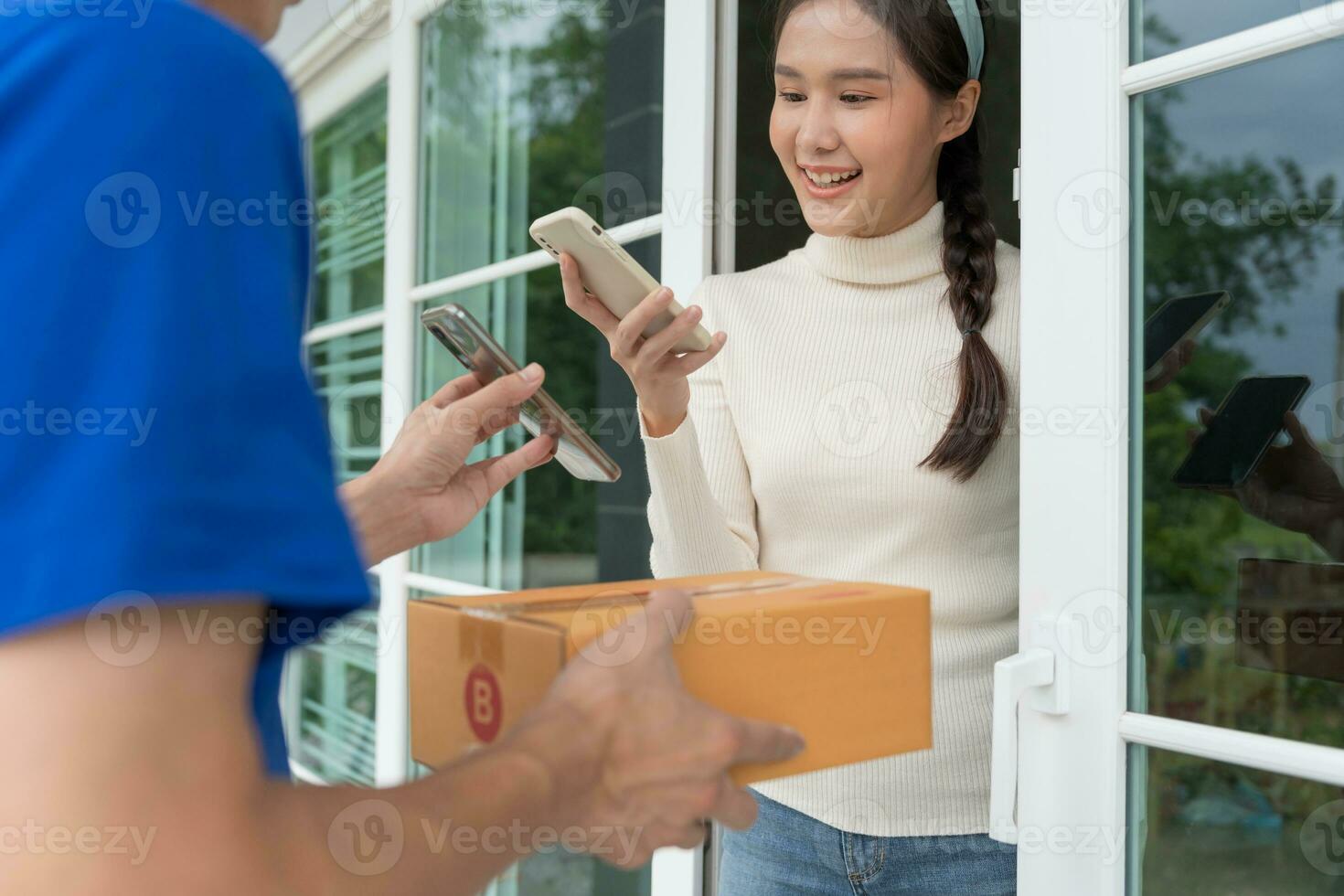 Happy smile Asian woman scan QR code for pay of food. Delivery man send deliver express. online shop, paper container, takeaway, postman, delivery service, packages, electronic money, Digital transfe photo