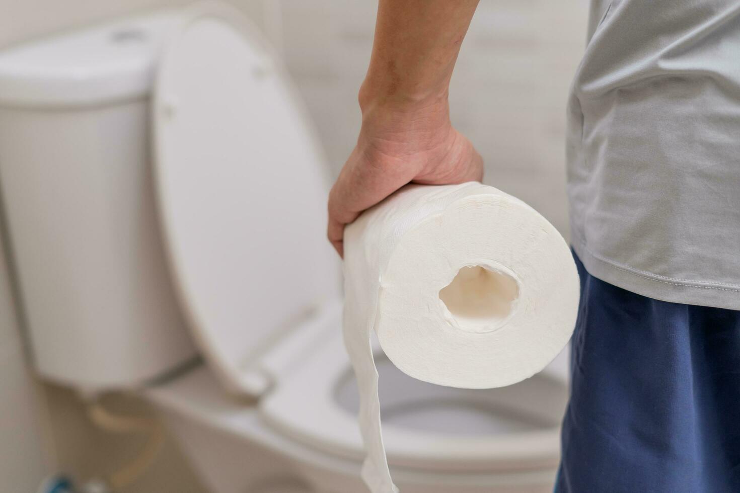 Constipation and diarrhea in bathroom. Hurt man touch belly  stomach ache painful. colon inflammation problem, toxic food, abdominal pain, abdomen, constipated in toilet, stomachache, Hygiene photo