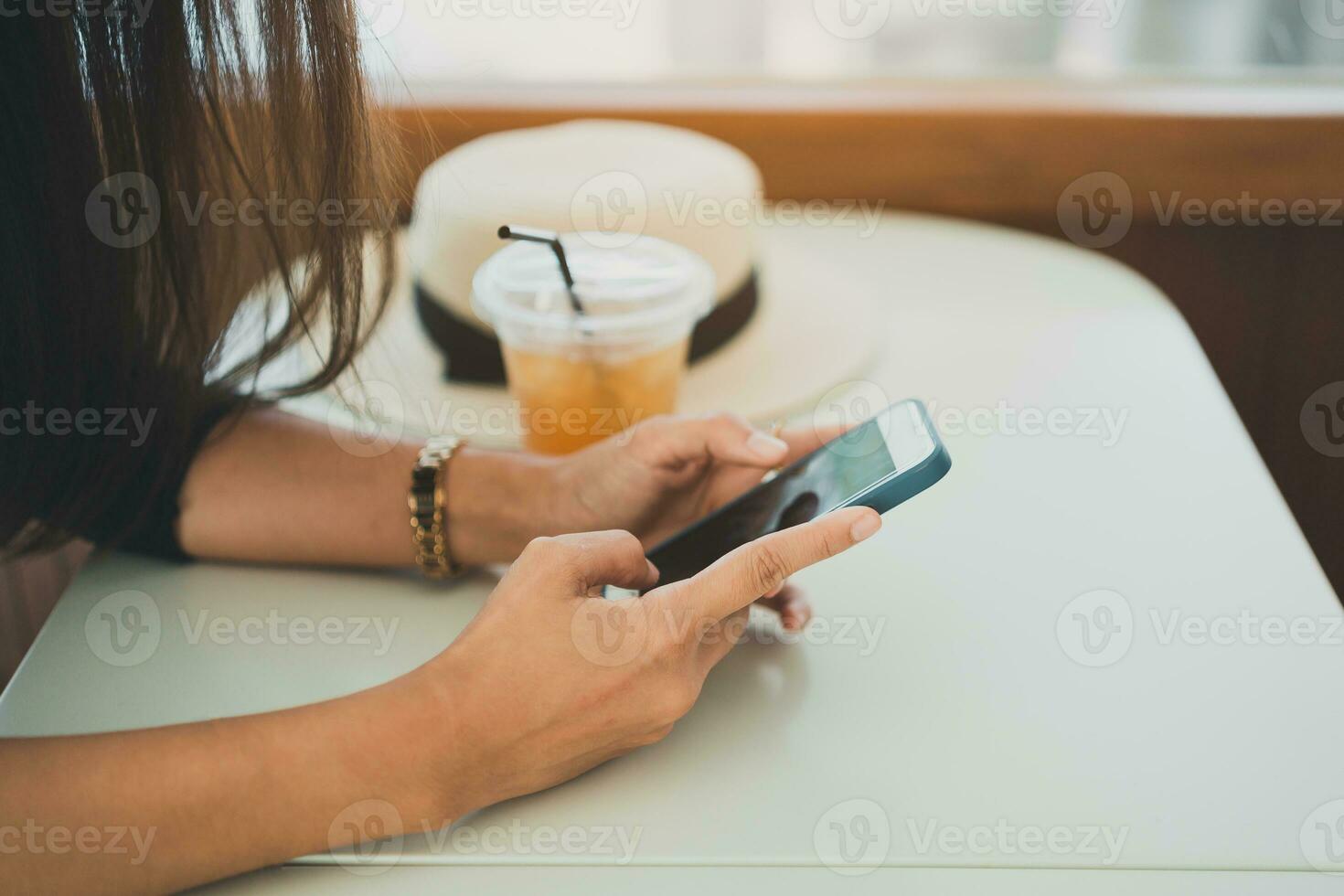 Hand's woman hold mobile phone text or message. Businesswoman use modern smartphone to browse web, read e-book, trade stocks. photo
