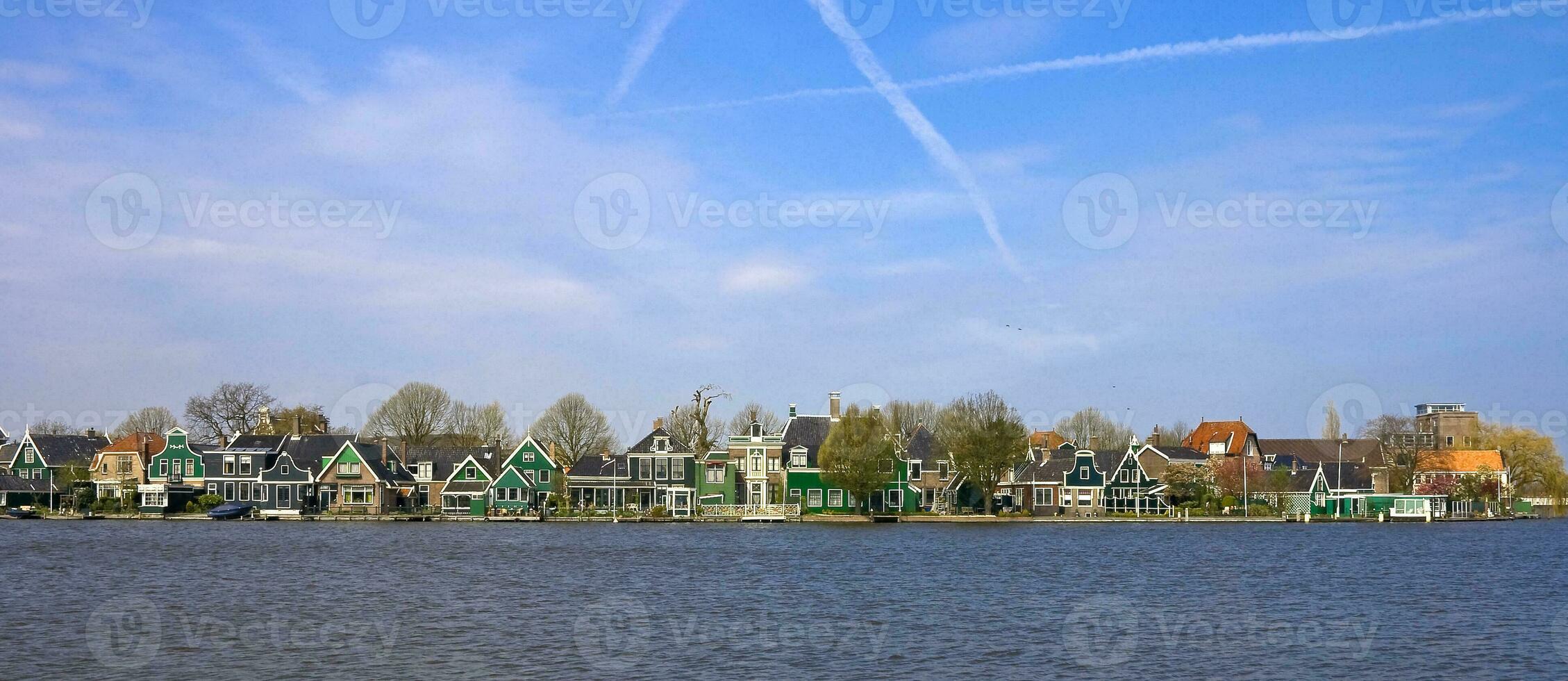 Netherlands colorful country of windmills and tulips flowers photo