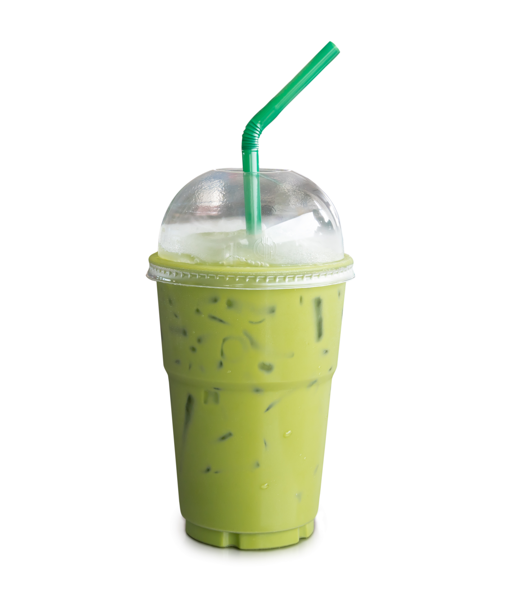 Iced matcha green tea with condensed milk in transparent plastic glass