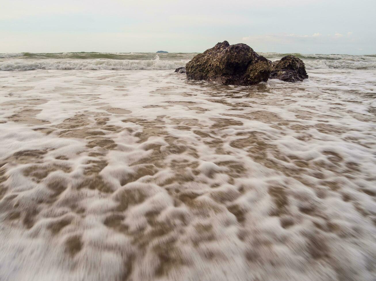 Front viewpoint landscape travel summer sea rock wind wave cool on holiday calm sea coastal Nature tropical Beautiful evening day At rayong Beach Thailand photo