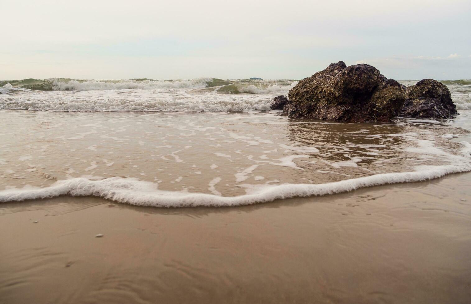 Front viewpoint landscape travel summer sea rock wind wave cool on holiday calm sea coastal Nature tropical Beautiful evening day At rayong Beach Thailand photo