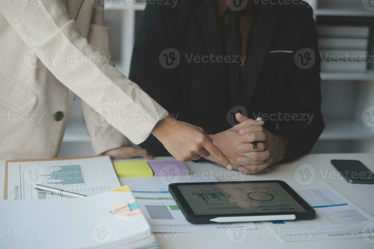 Audit concept,Administrator business man financial inspector and secretary making report calculating balance. Internal Revenue Service checking document. photo