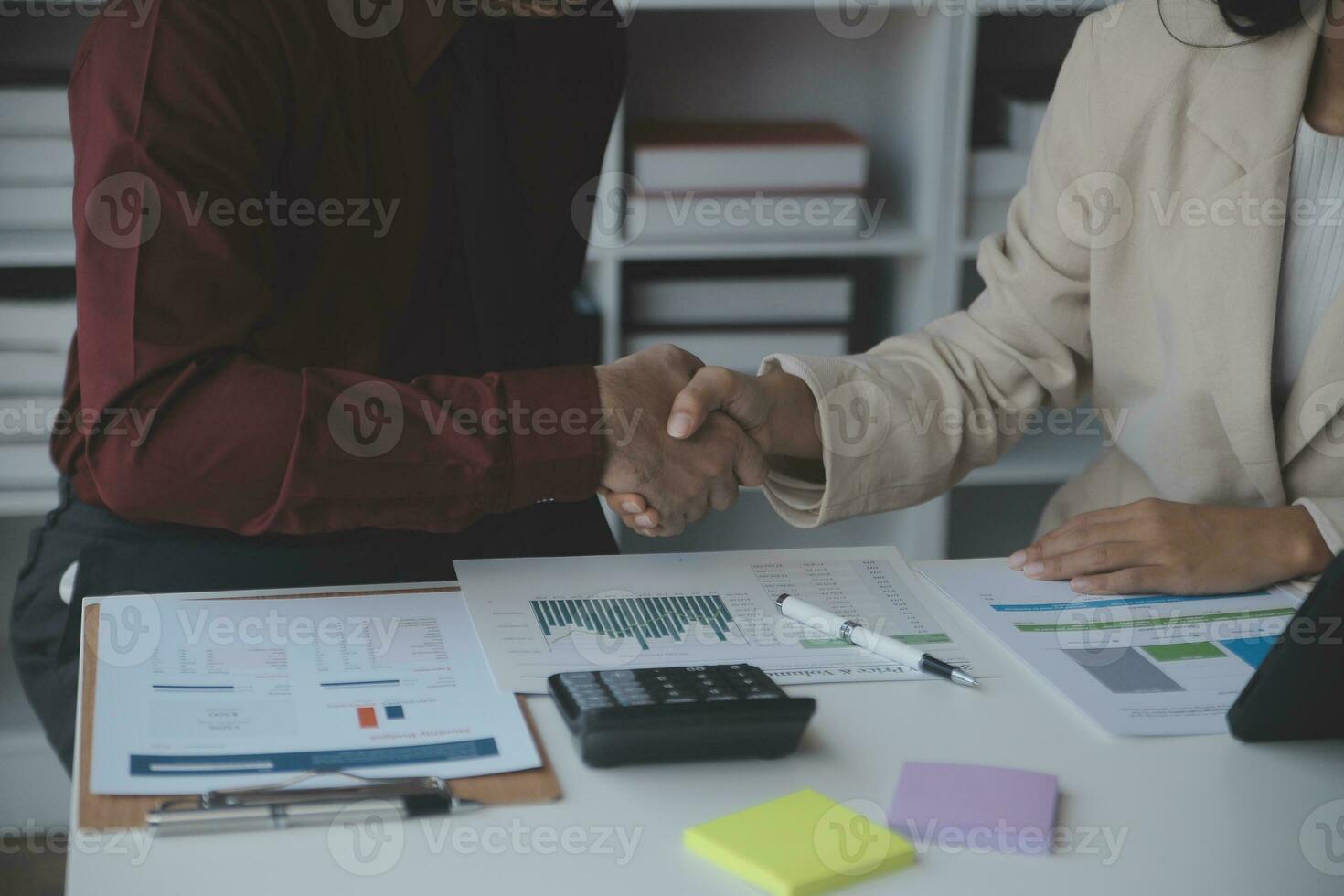 Audit concept,Administrator business man financial inspector and secretary making report calculating balance. Internal Revenue Service checking document. photo
