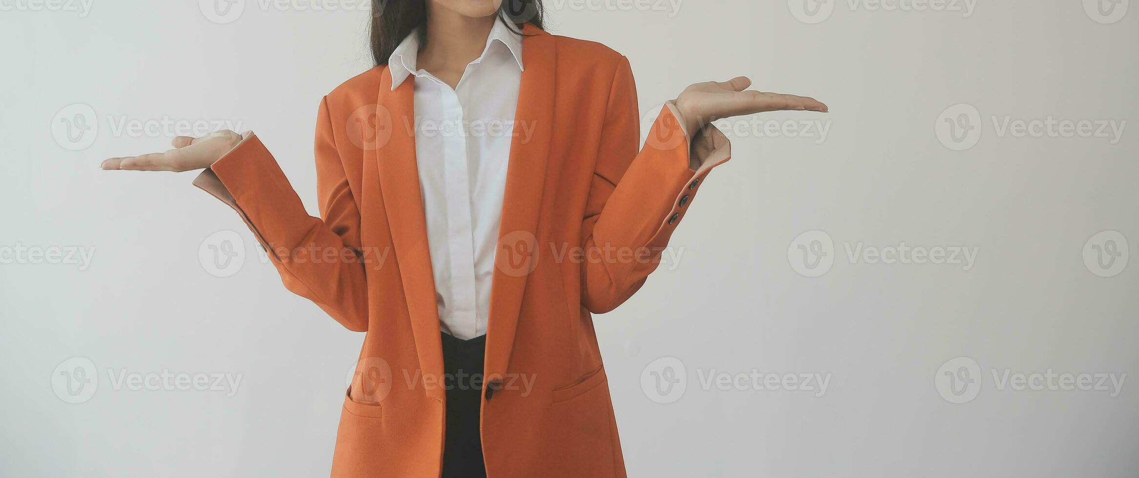 Asian Business woman using calculator and laptop for doing math finance on an office desk, tax, report, accounting, statistics, and analytical research concept photo