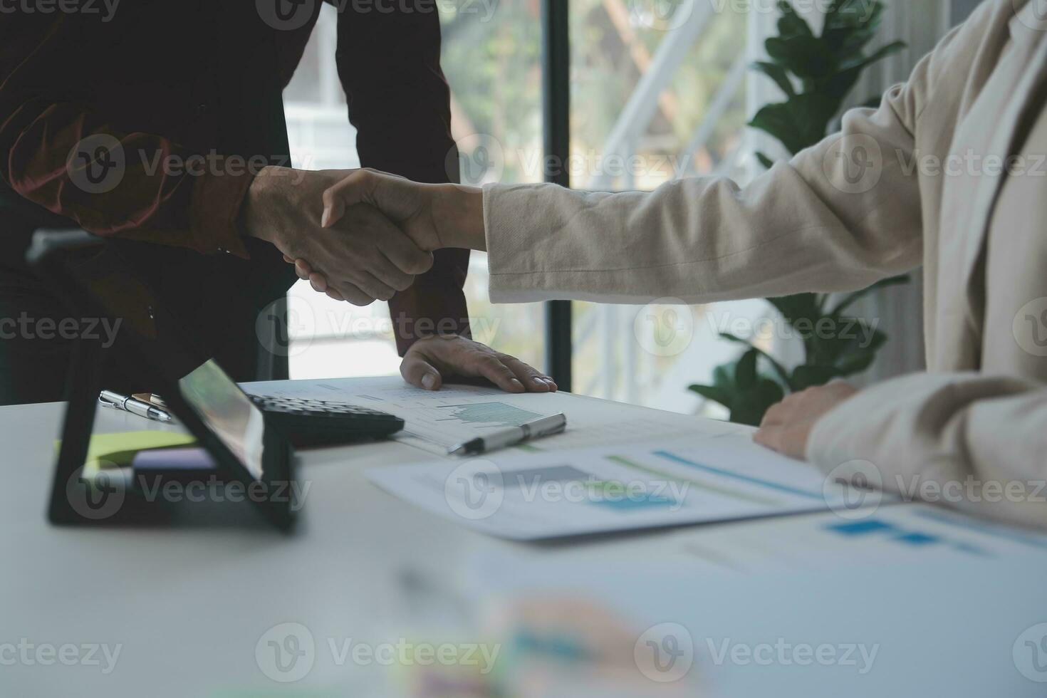 Audit concept,Administrator business man financial inspector and secretary making report calculating balance. Internal Revenue Service checking document. photo