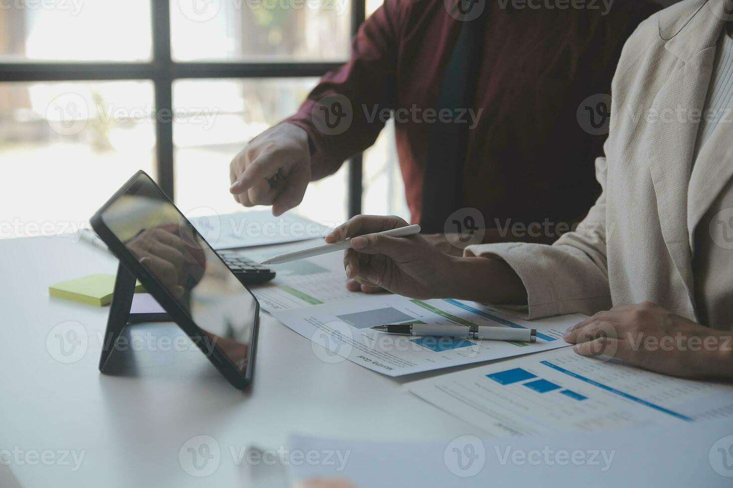 Audit concept,Administrator business man financial inspector and secretary making report calculating balance. Internal Revenue Service checking document. photo