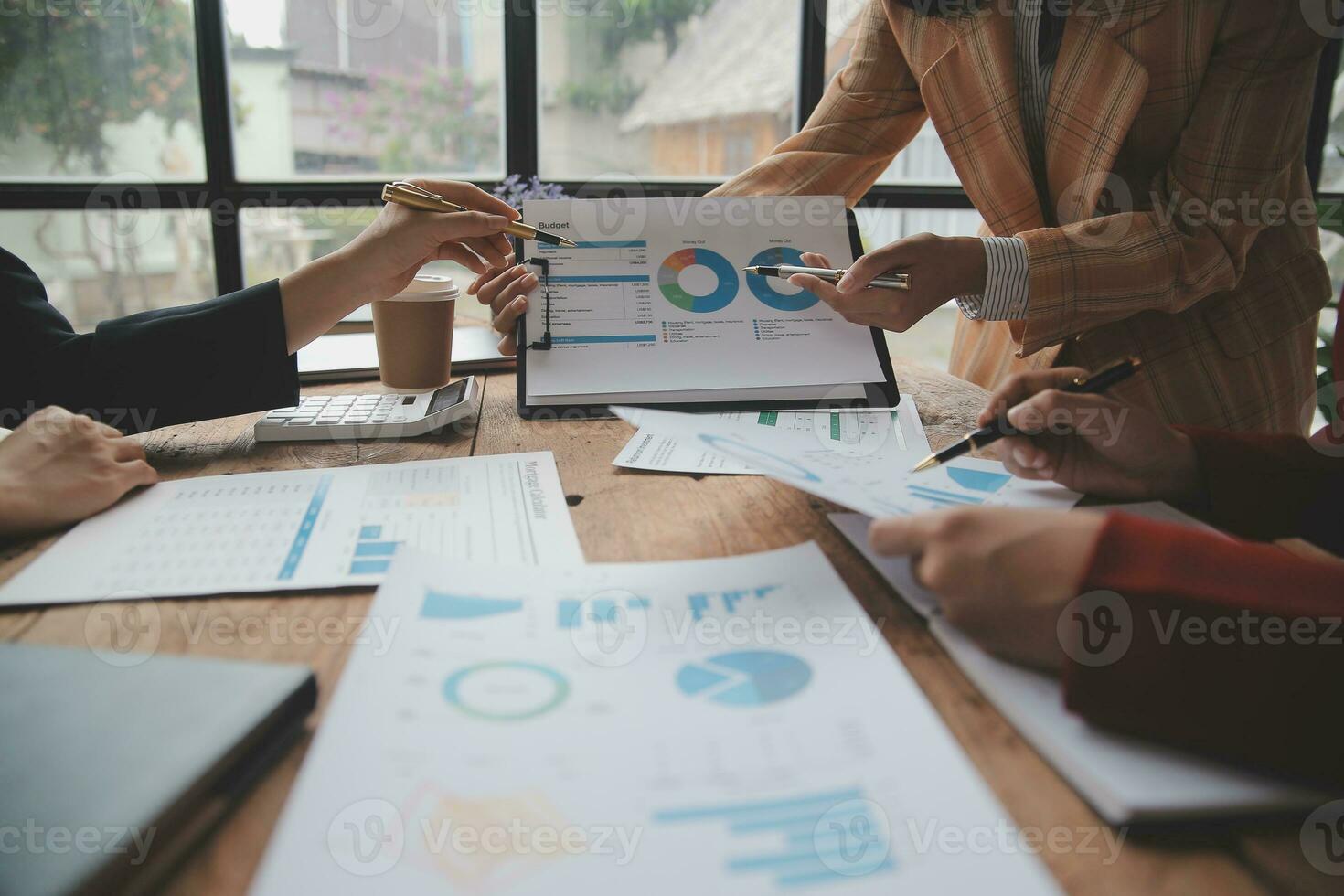 Team of business people are meeting to analyze data for marketing plan,Market research reports and income statistics, Financial and Accounting concept. photo
