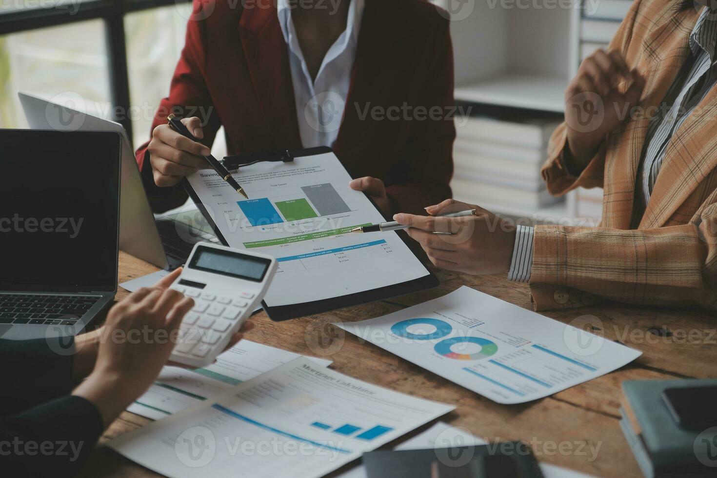 Team of business people are meeting to analyze data for marketing plan,Market research reports and income statistics, Financial and Accounting concept. photo