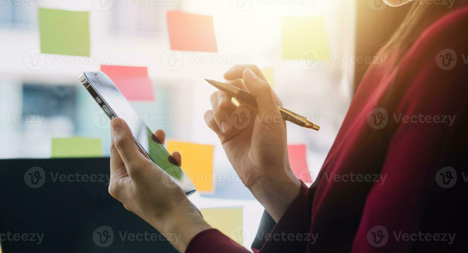 Asian Business woman using calculator and laptop for doing math finance on an office desk, tax, report, accounting, statistics, and analytical research concept photo