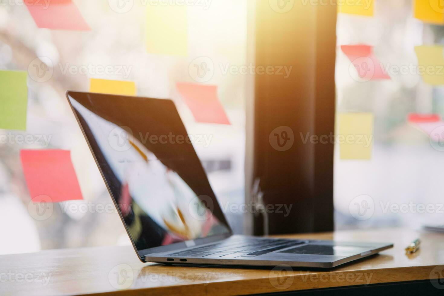 Asian Business woman using calculator and laptop for doing math finance on an office desk, tax, report, accounting, statistics, and analytical research concept photo