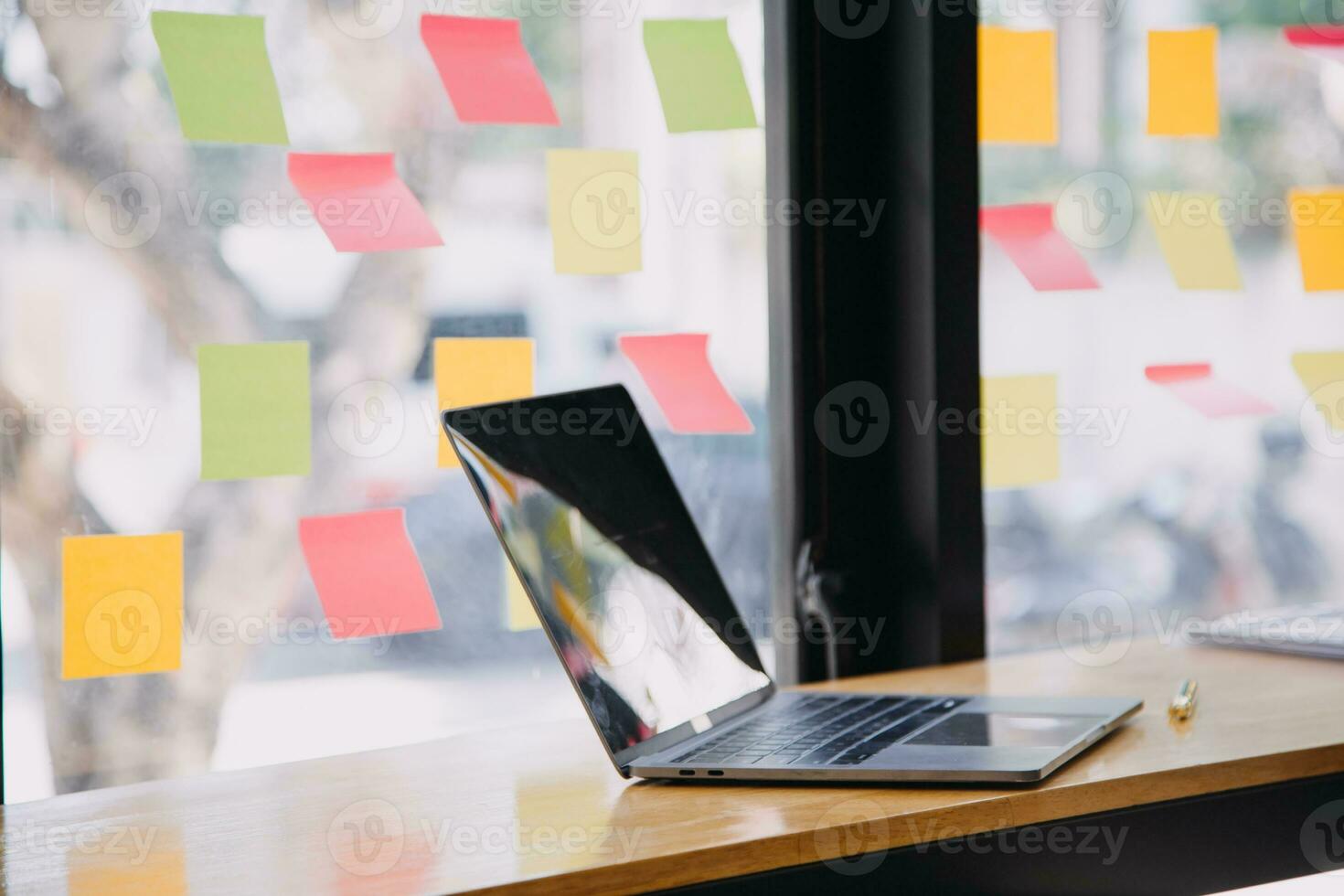 Asian Business woman using calculator and laptop for doing math finance on an office desk, tax, report, accounting, statistics, and analytical research concept photo