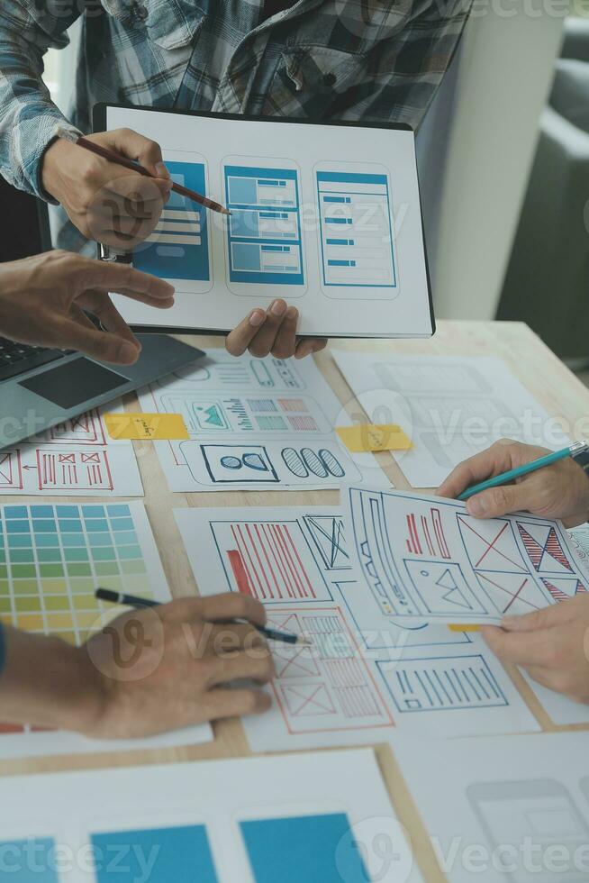Website designer Creative planning application development draft sketch drawing template layout framework wireframe design studio . User experience concept . photo