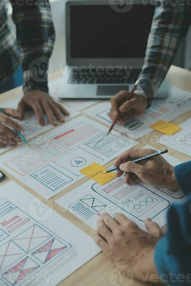 Website designer Creative planning application development draft sketch drawing template layout framework wireframe design studio . User experience concept . photo