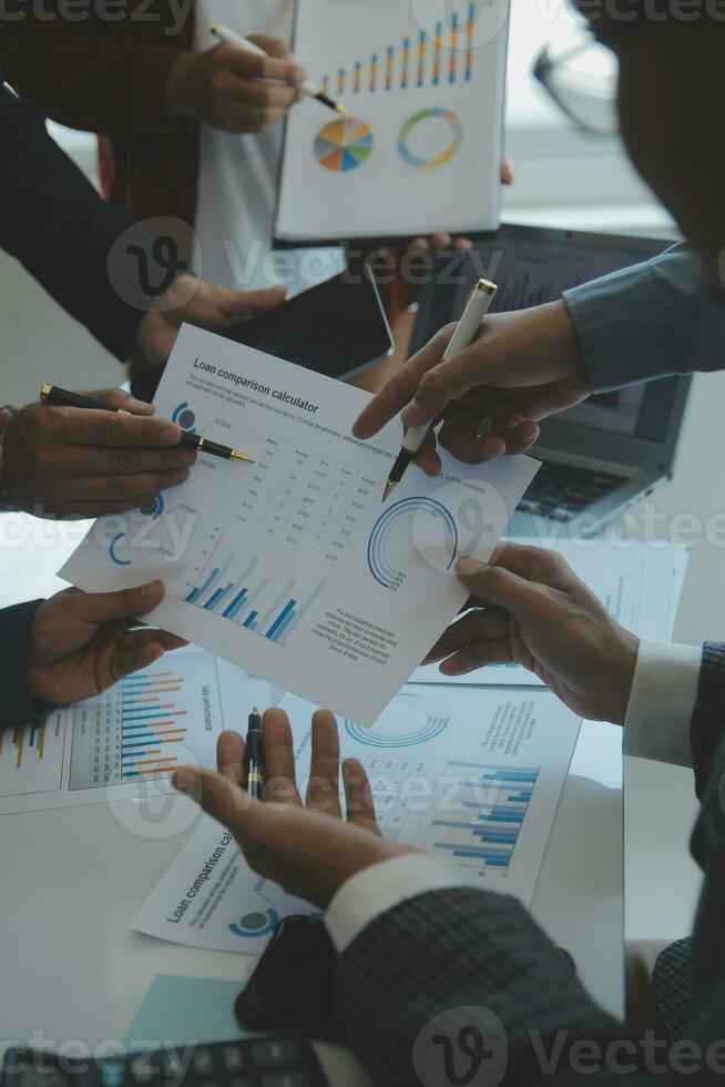 Team of business people are meeting to analyze data for marketing plan,Market research reports and income statistics, Financial and Accounting concept. photo