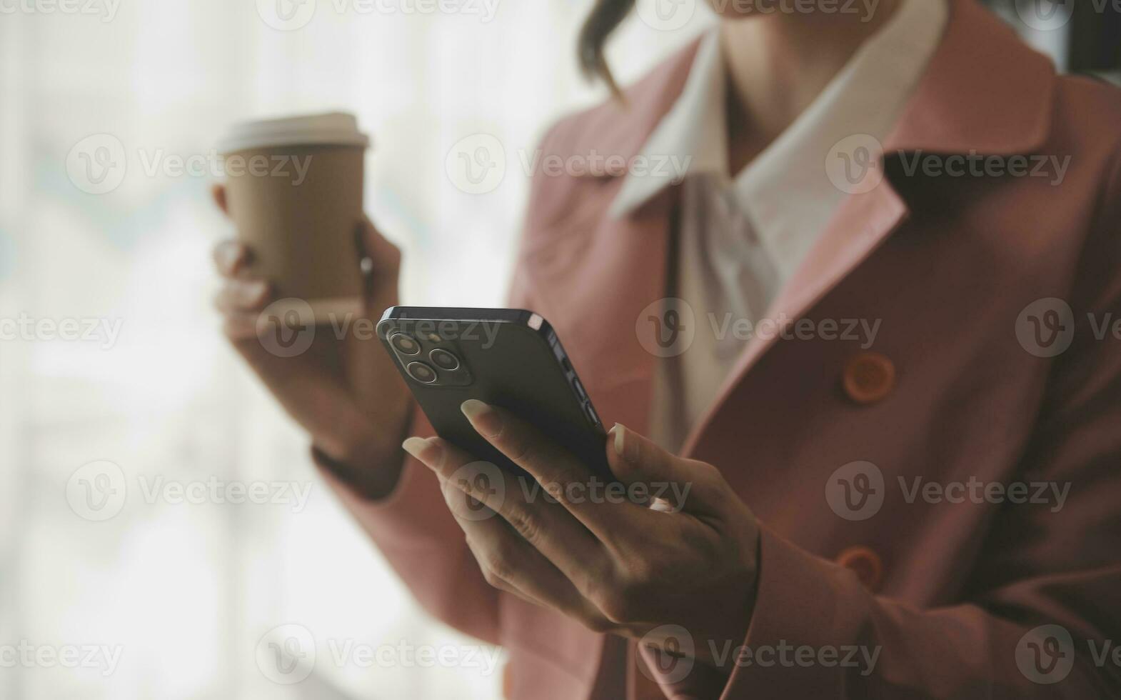 Beautiful female call center operator working on computer in office photo