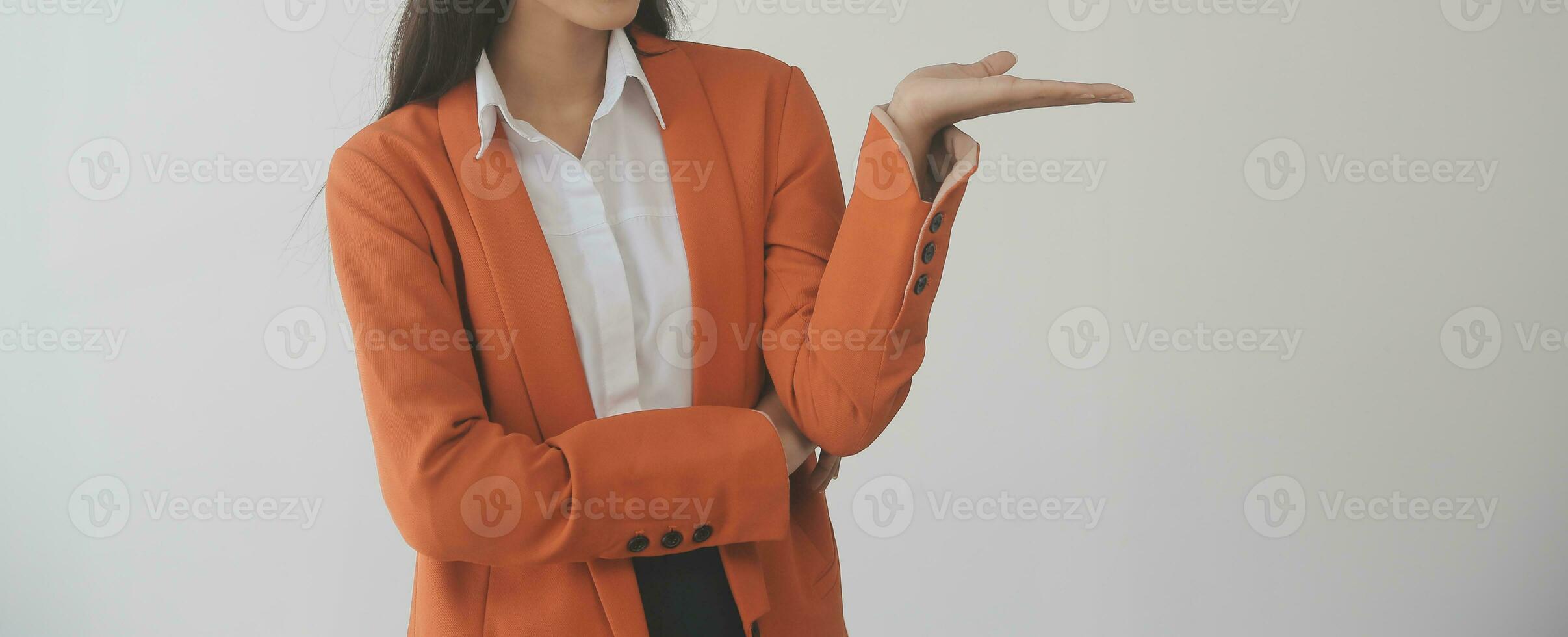 Portrait of Young Asian woman hand freelancer is working her job on computer tablet in modern office. Doing accounting analysis report real estate investment data, Financial and tax systems concept. photo