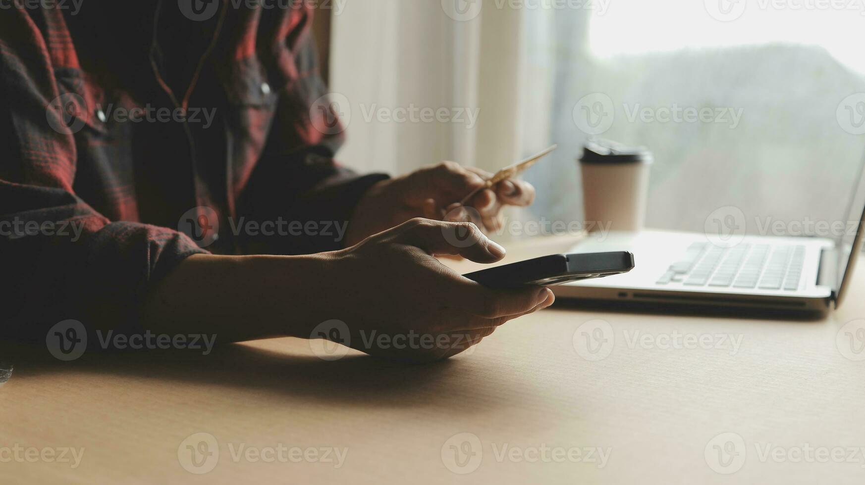 Online payment,businessman hands holding credit card and using laptop for online shopping. Cyber Monday Concept photo