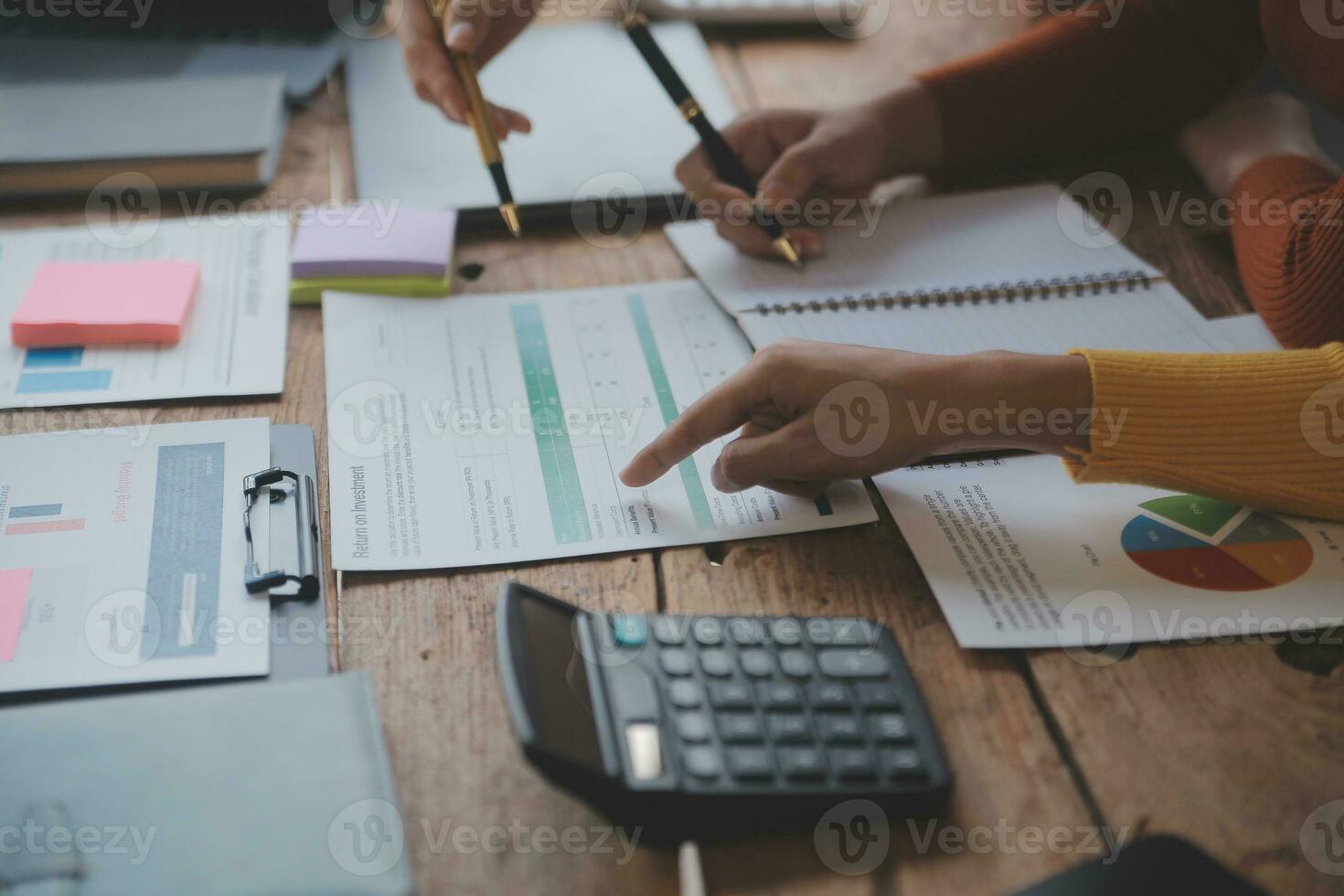 Team of business people are meeting to analyze data for marketing plan,Market research reports and income statistics, Financial and Accounting concept. photo
