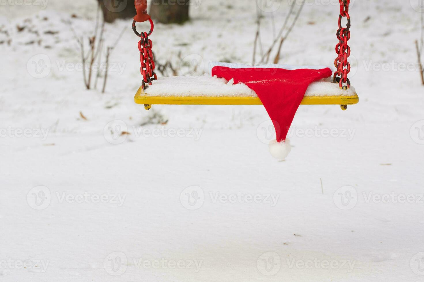 Hat of santa on swing seat photo