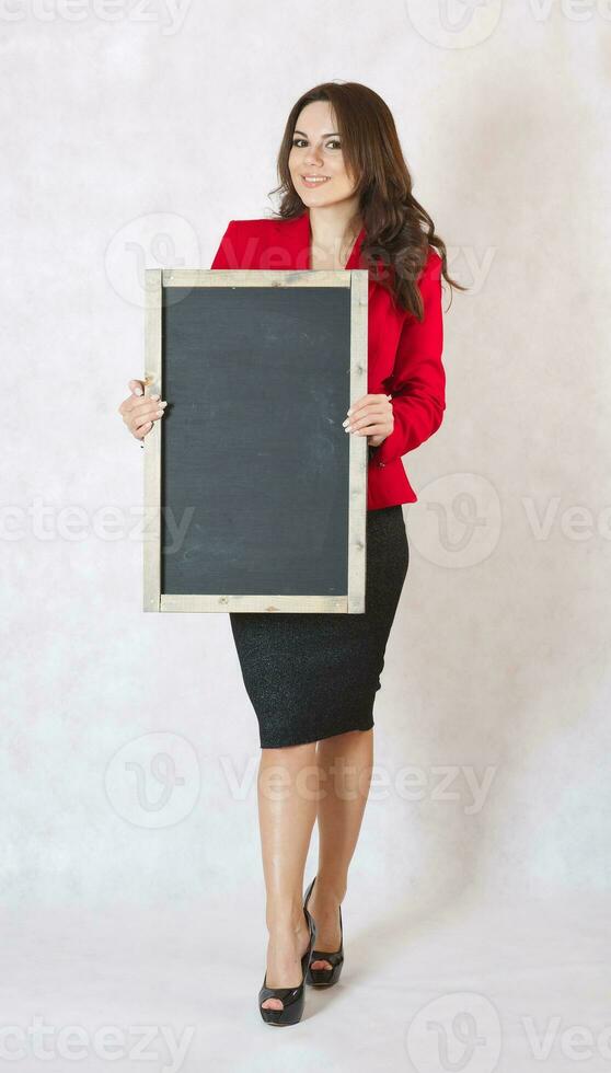 Young woman with a black chalk board photo