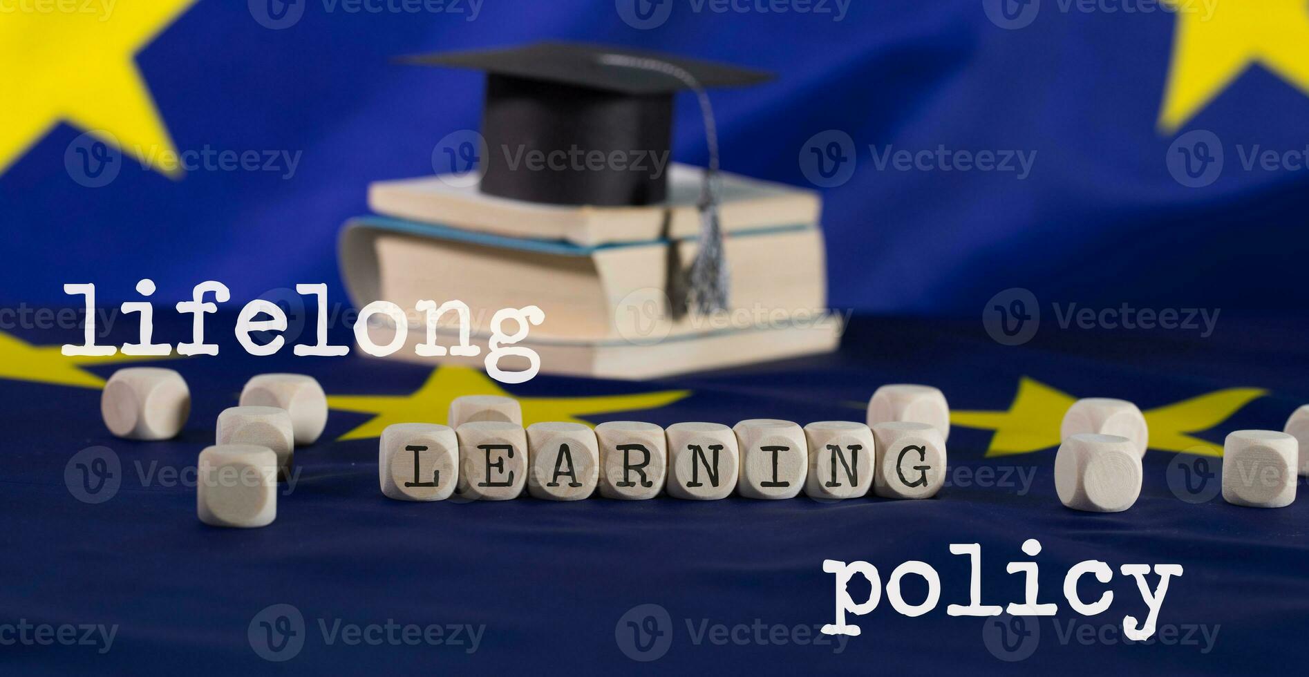Words LIFELONG  LEARNING POLICY composed of wooden letters. photo