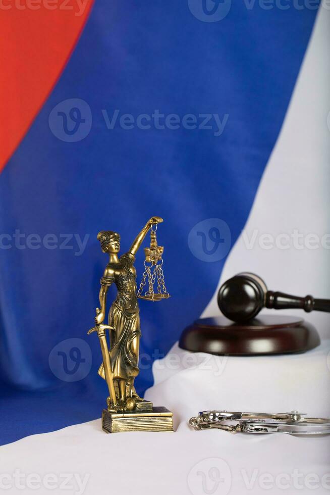 Statue of Themis on a flag of Russian Federation. photo