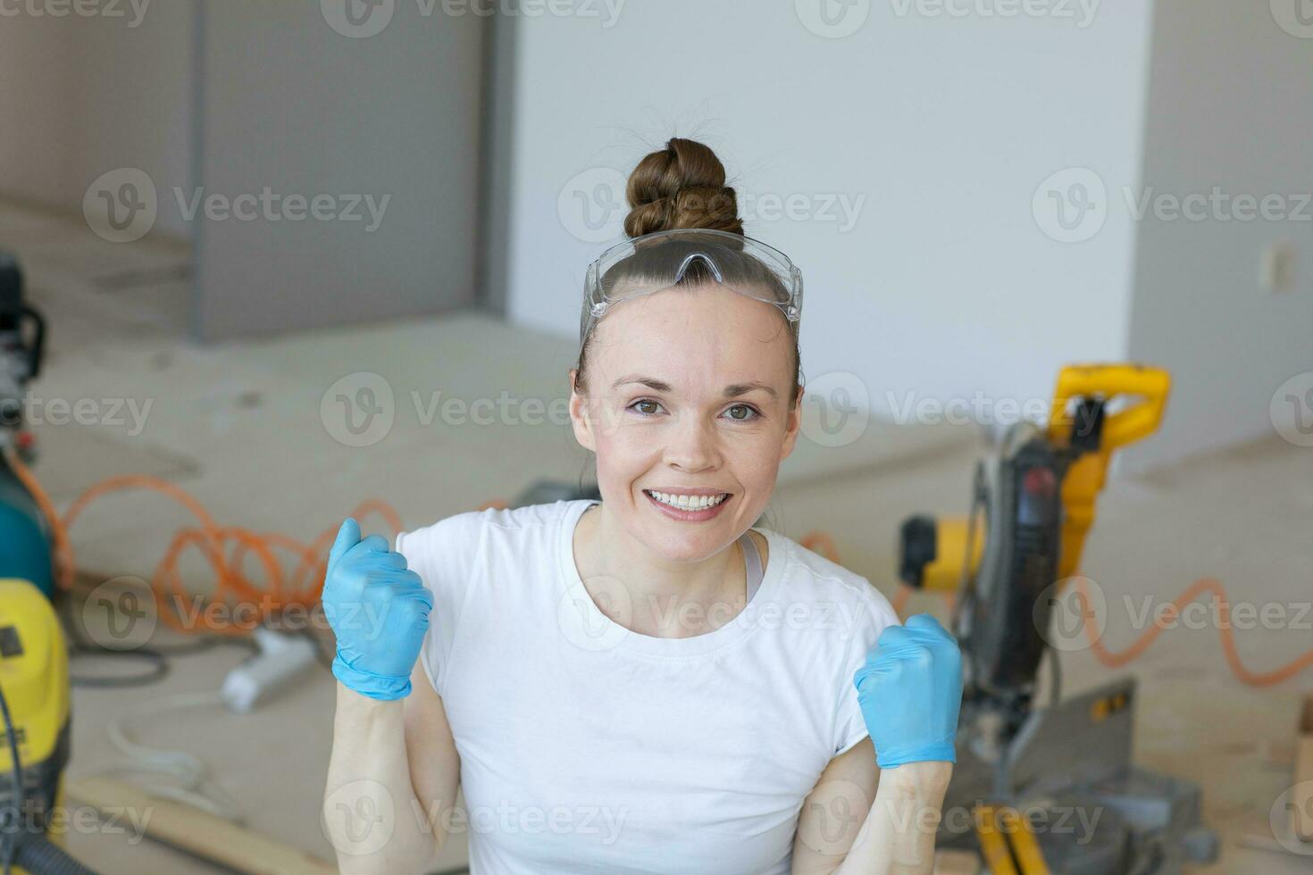 Young lady deals with wooden plinth photo