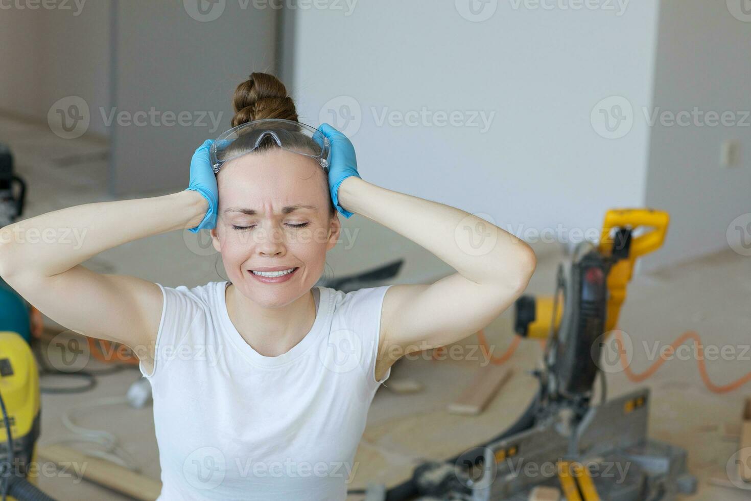 Young lady deals with wooden plinth photo