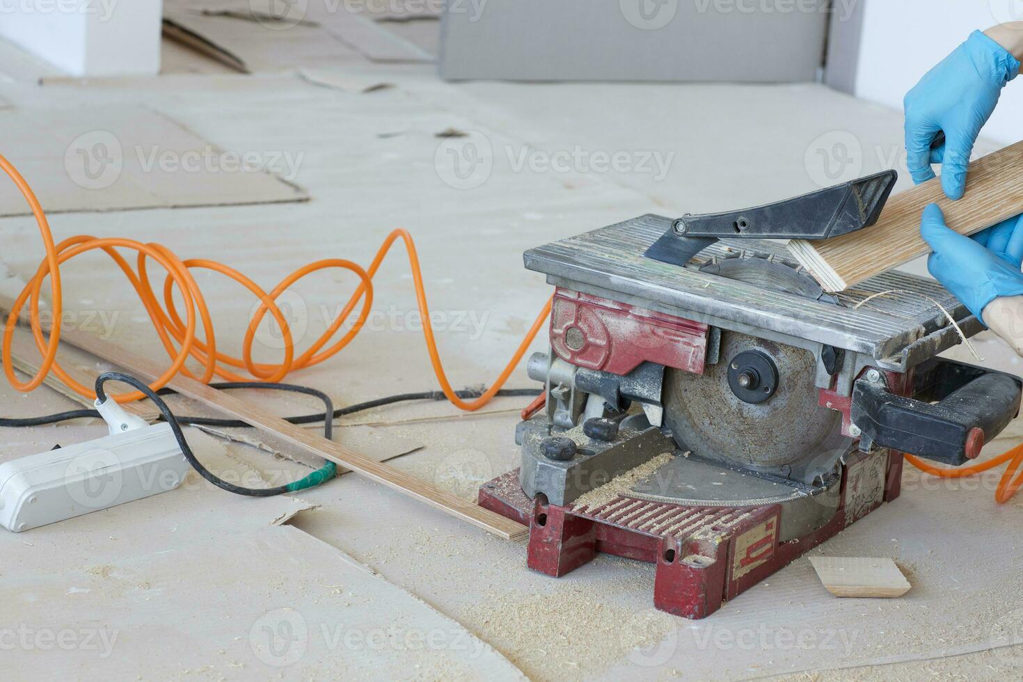 Woodworking machine with circular blade for cutting plinth. photo