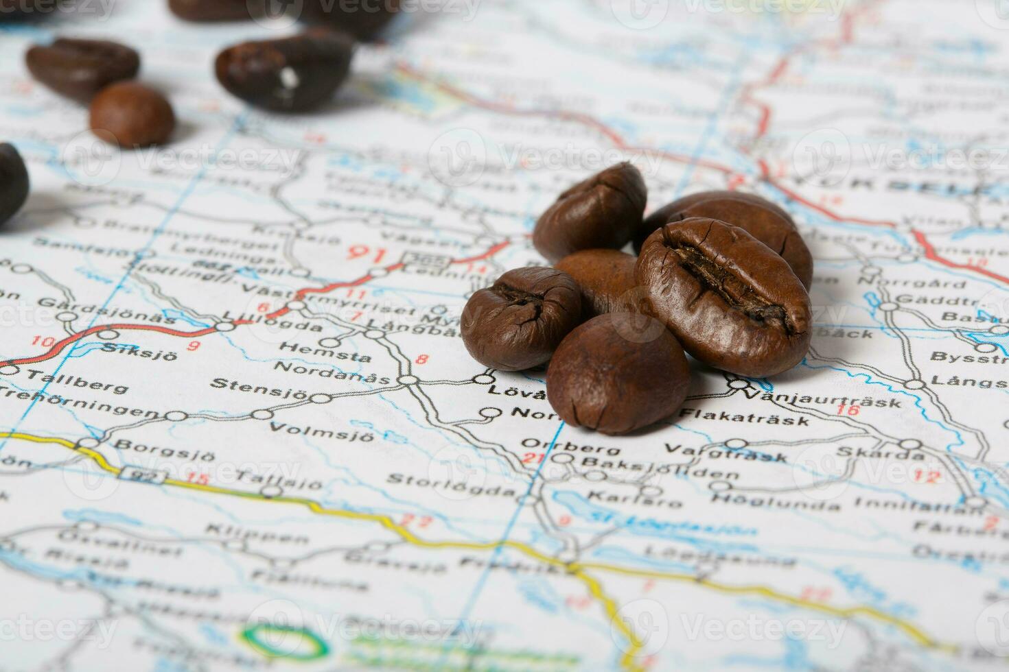 Coffee beans on a map. Closeup photo