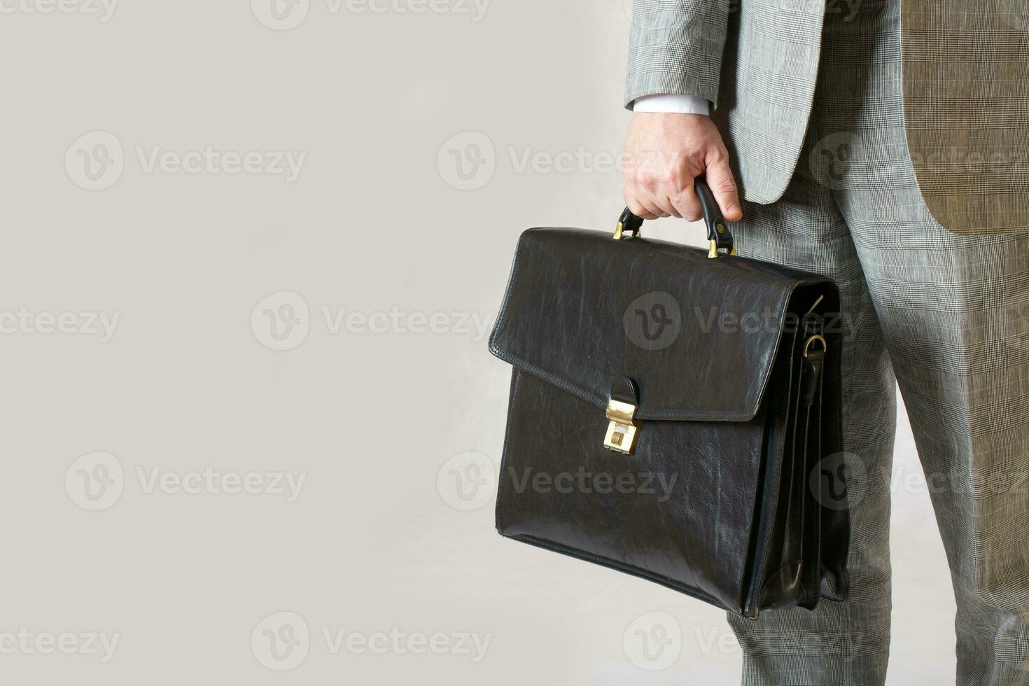 A business keeps his bag. Closeup photo