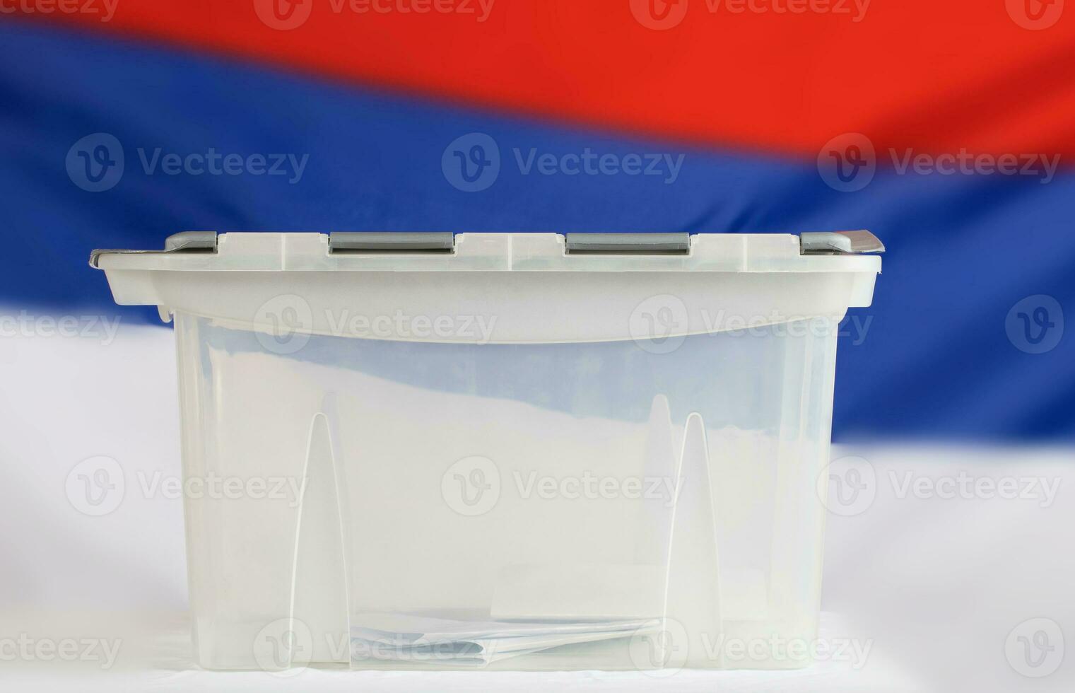 Ballot box with some ballot papers inside. photo