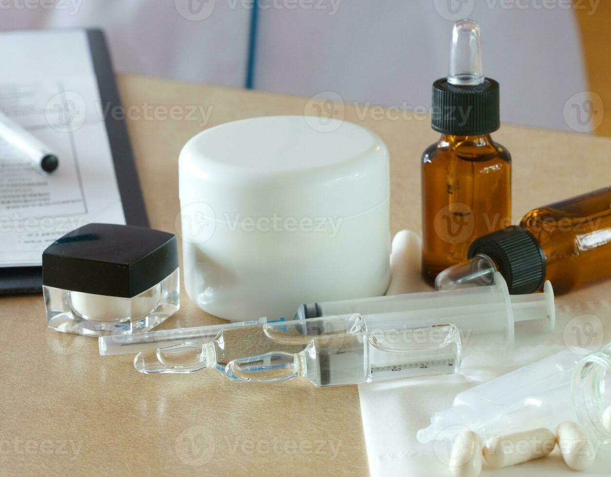 Cosmetic medication on a table of a dermatologist photo