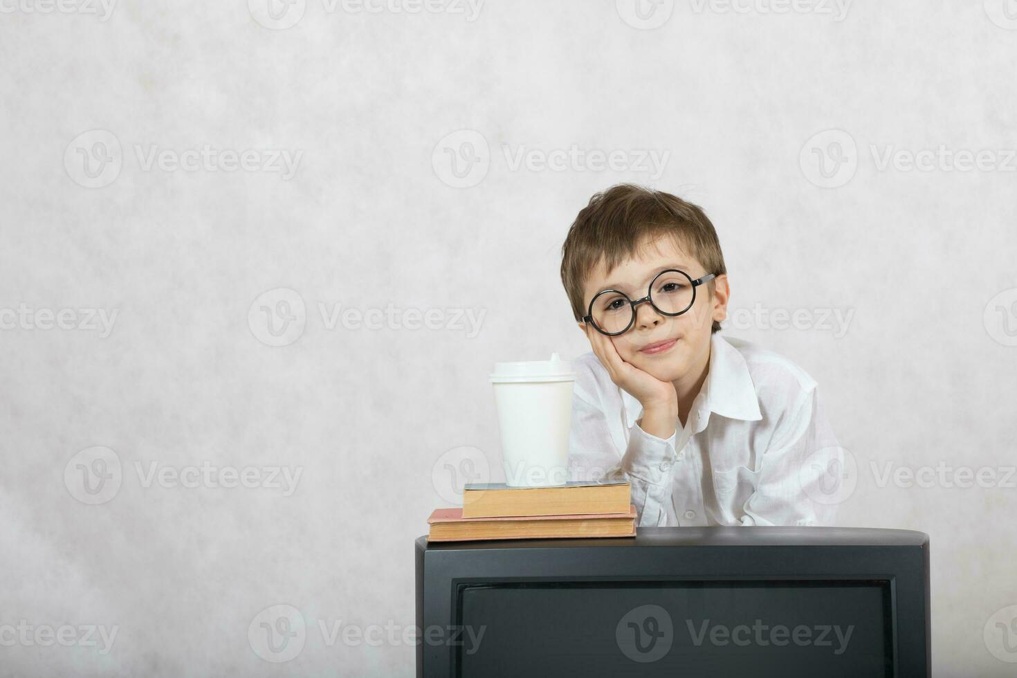 Boy and an old TV. Free space for a text. photo