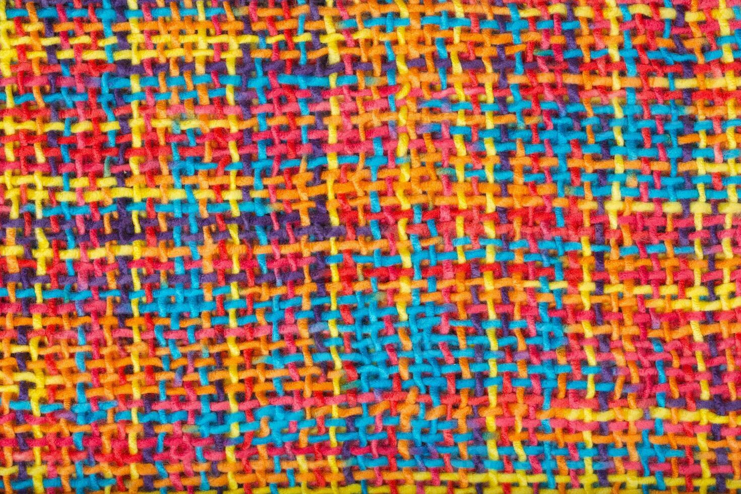 Colorful knitted surface. Closeup photo