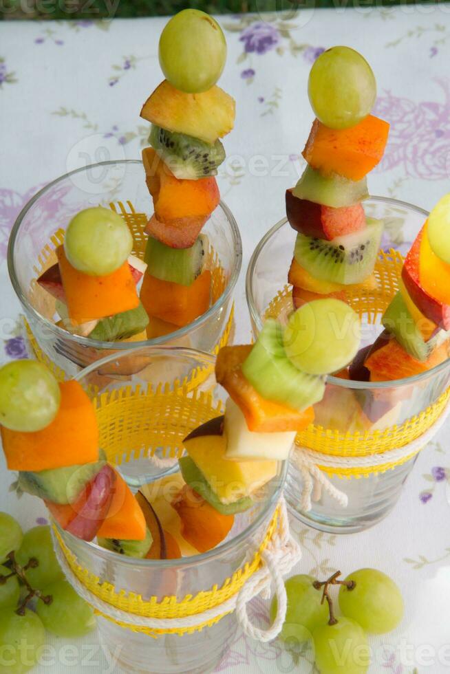 Fruit salad skewers photo