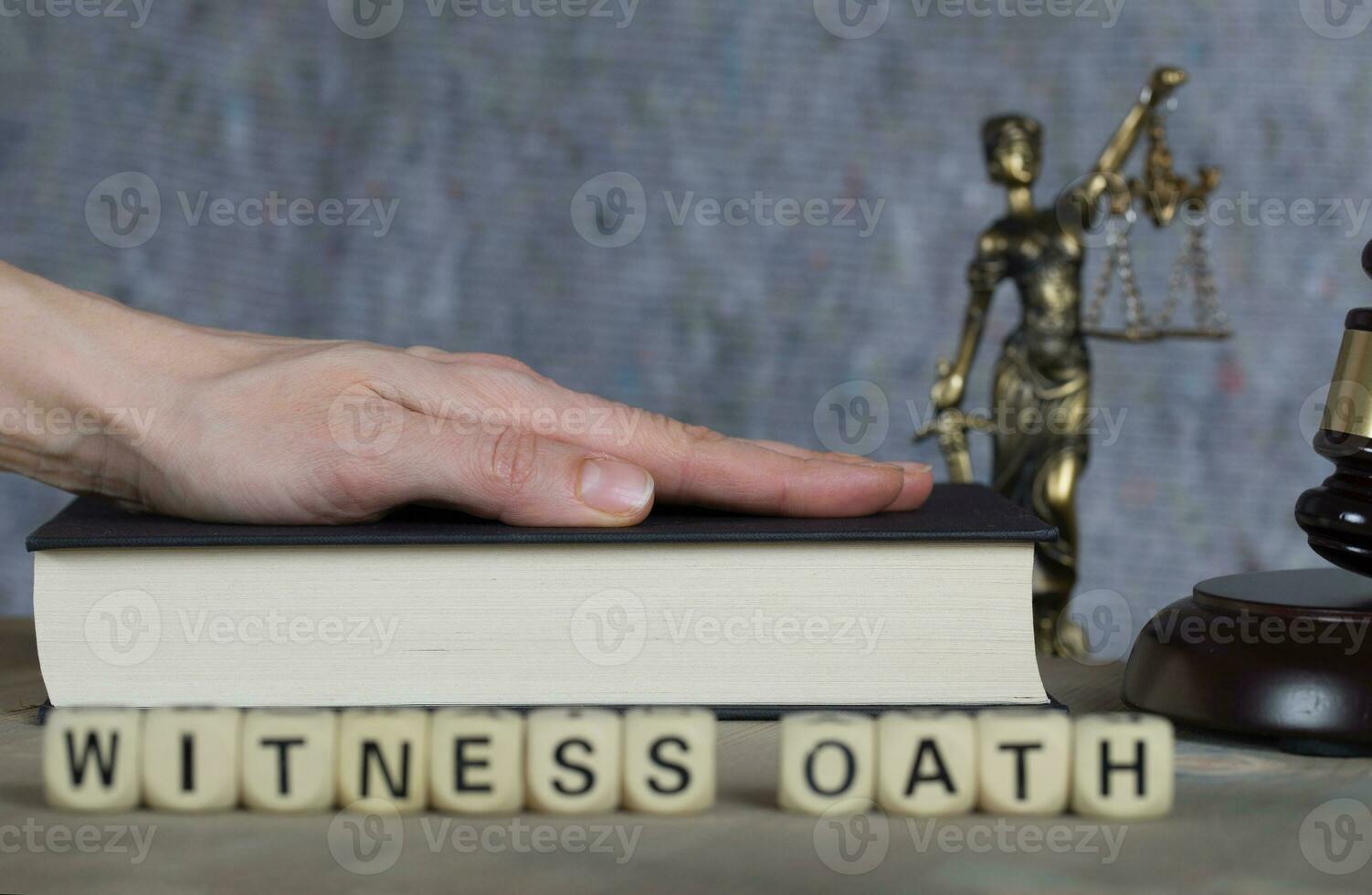 Word WITNESS OATH composed of wooden letters. 24986680 Stock Photo at Vecteezy