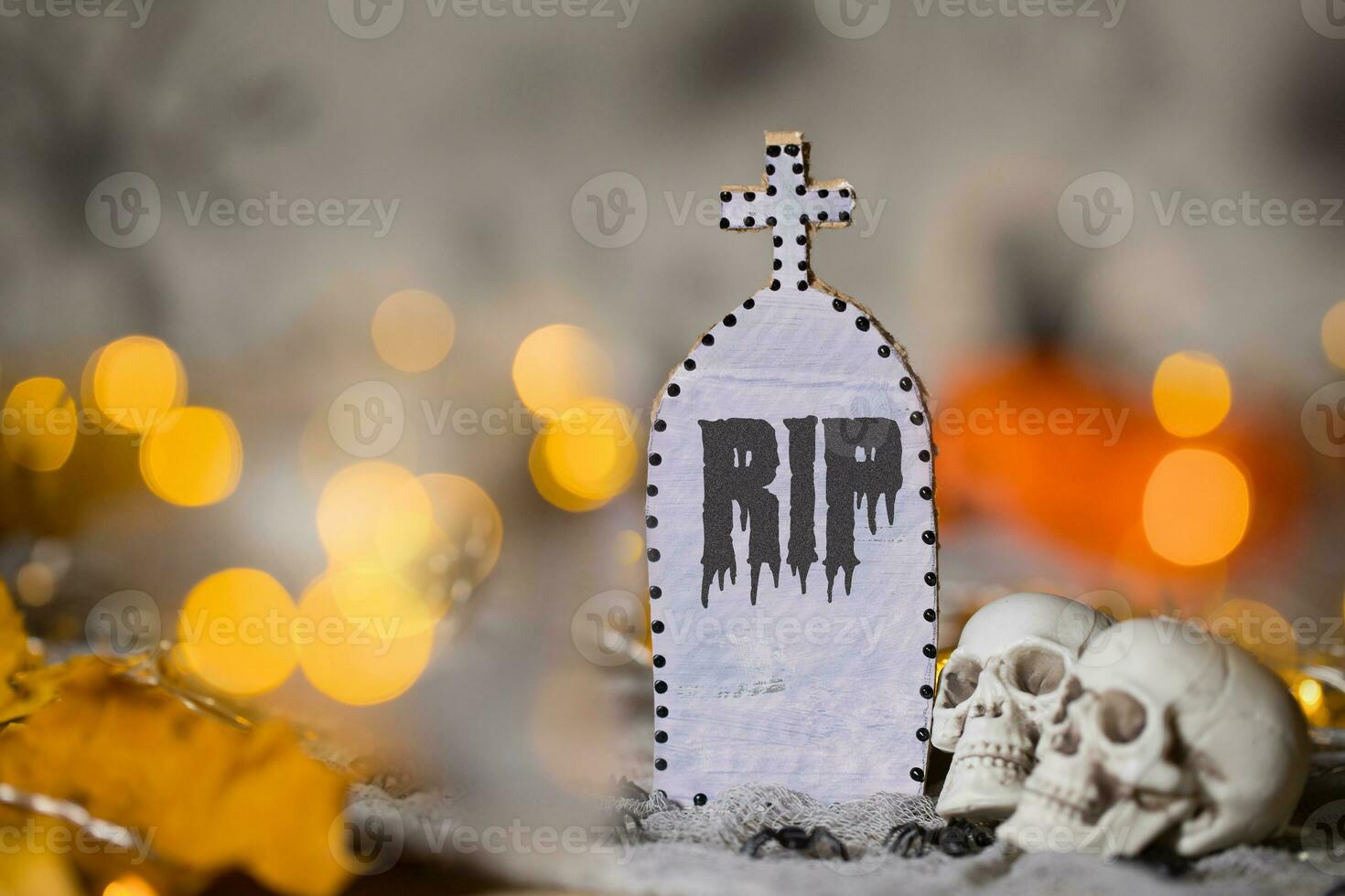 Grave and two skulls. Closeup photo