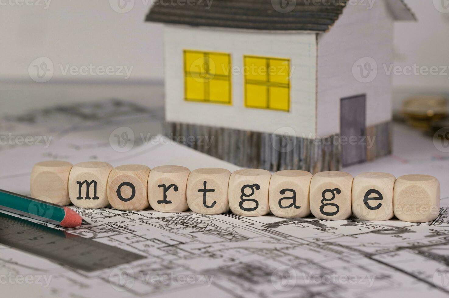 Word  MORTGAGE composed of wooden letters. Closeup photo