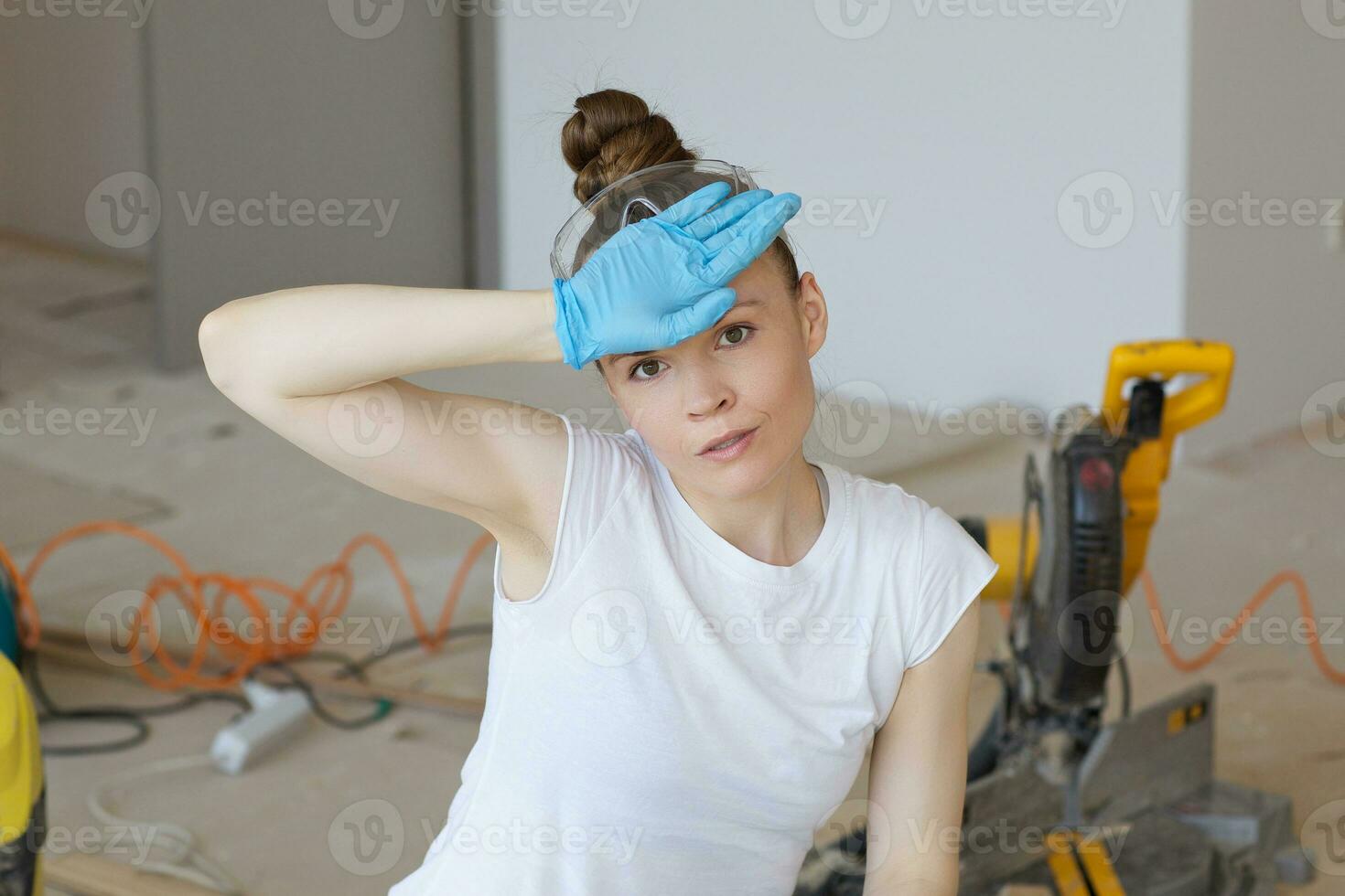 Young lady deals with wooden plinth photo