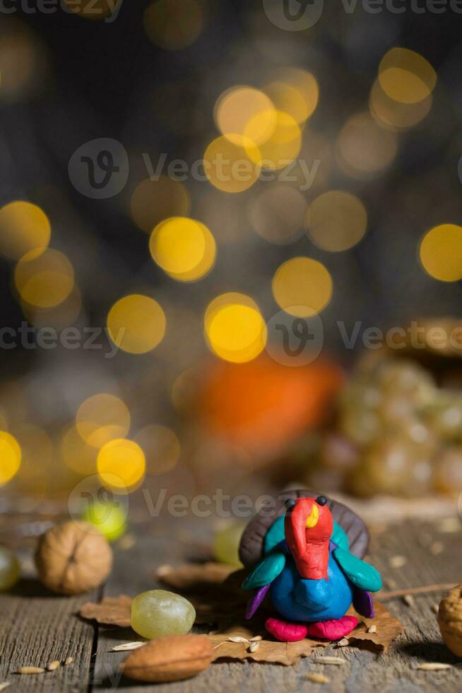 Handmade turkey on Thanksgiving background with blurred night lights. photo