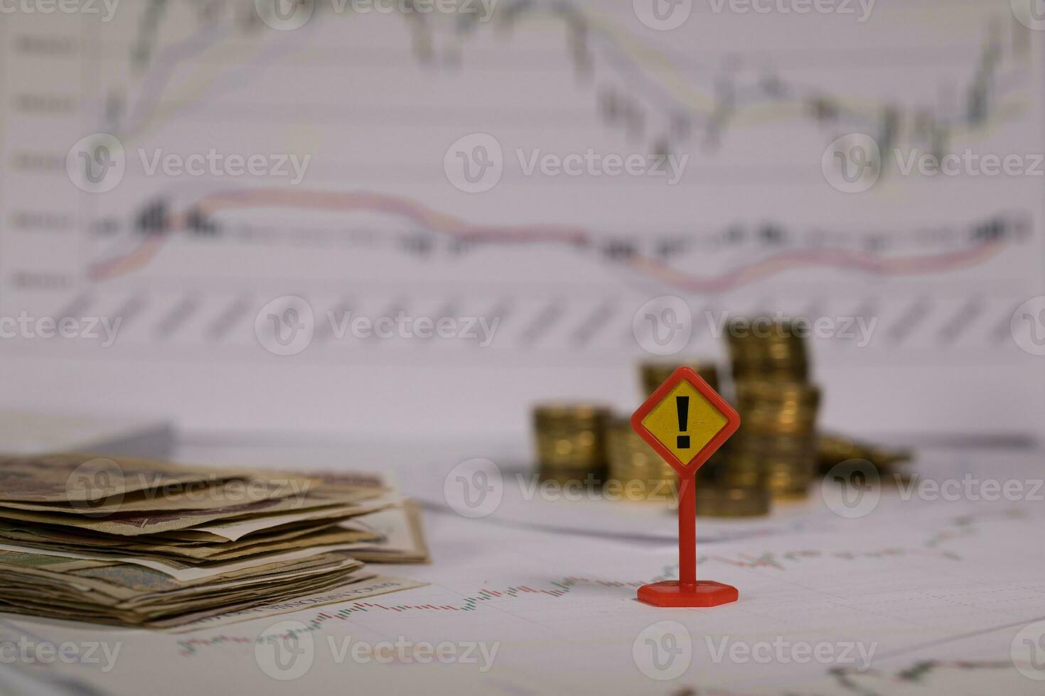 Sign of exclamatory mark on a stock market diagram. photo