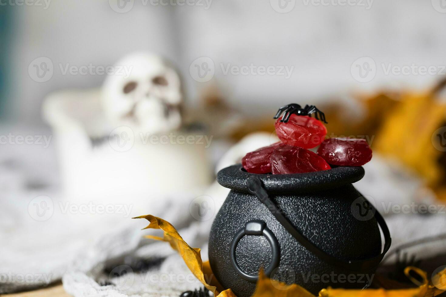 Trick or treat - Candies in cauldrons for Halloween. photo