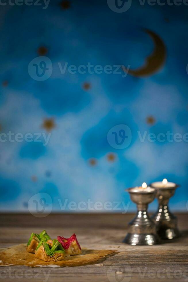 Arabic sweets on a wooden surface. photo