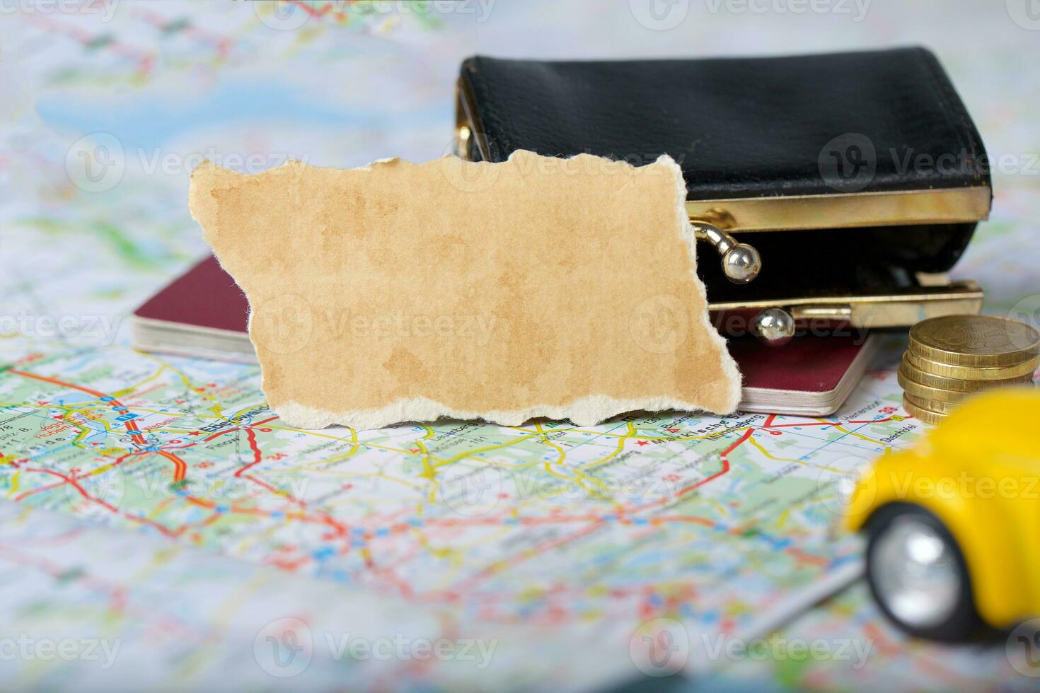 Wallet, coins, pass on a map. photo